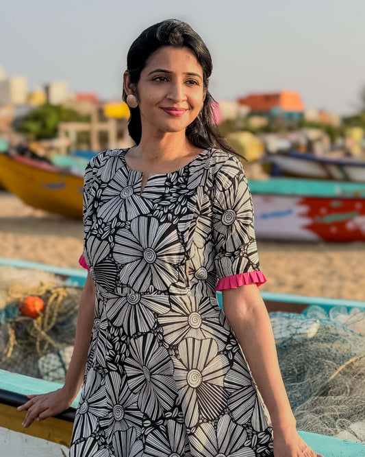 Black and white floral cotton feeding dress with pink trim
